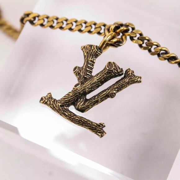 Authentic LOUIS VUITTON LV Wood Initial Gold MP2780 Necklace - Picture 2 of 12